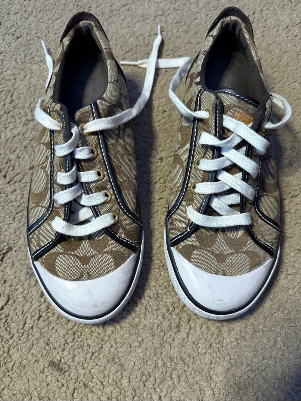 Coach women’s Brown Signature Canvas Low-Top Sneakers